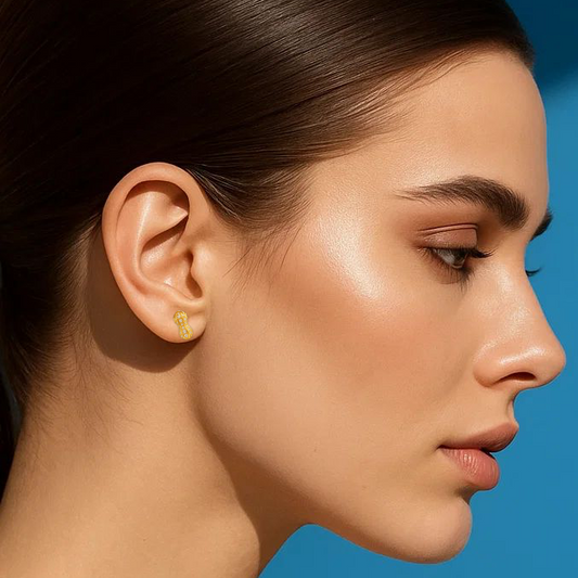 Woman with a ponytail against a blue background