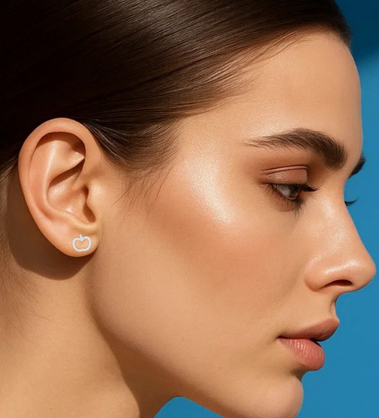 Close-up of a woman's profile with a blue background