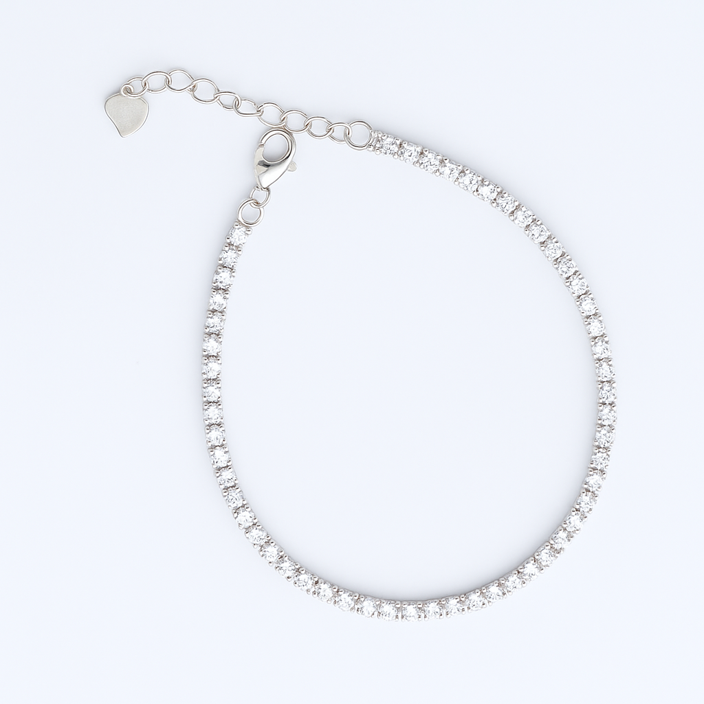 Silver bracelet on a light gray background