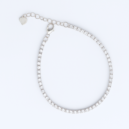 Silver bracelet on a light gray background