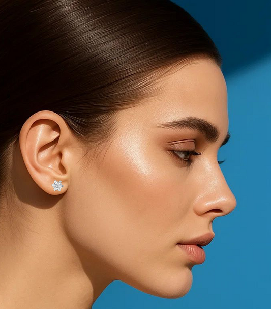 Close-up of a woman's profile with a blue background
