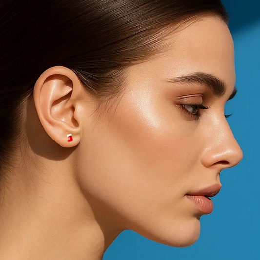 Woman with a ponytail against a blue background