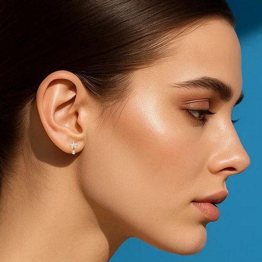 Woman with a ponytail against a blue background