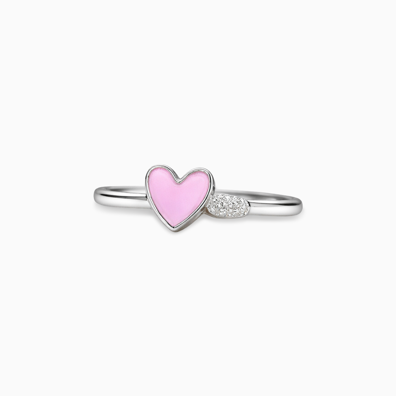 Silver ring with a pink heart-shaped gem on a white background