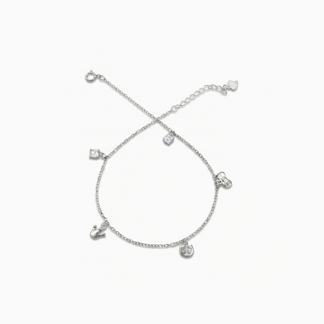 Silver bracelet with heart-shaped charms on a white background