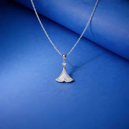 Silver necklace with a pendant on a blue background