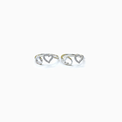 Pair of sterling silver heart design toe rings with zircon accents