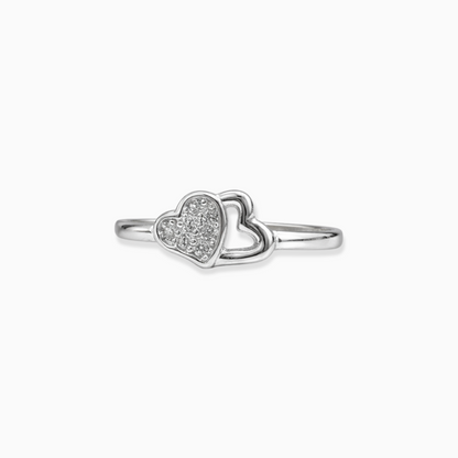 Silver heart-shaped ring with embedded stones on a white background