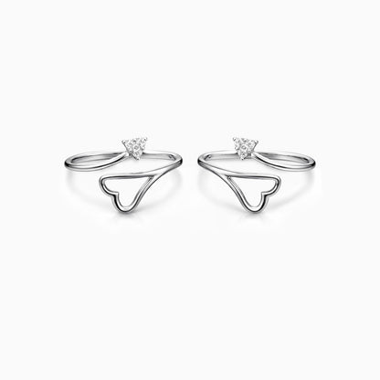 Pair of sterling silver open-heart toe rings with zircon accent
