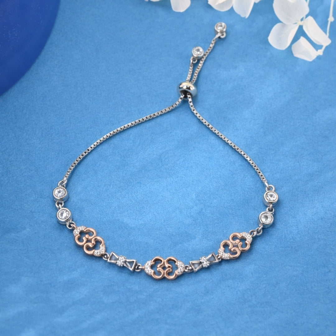 Delicate bracelet with floral designs on a blue background